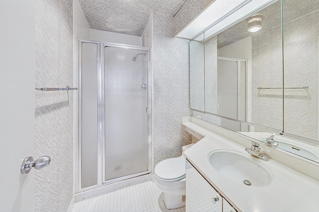 155 N Harbor Dr Unit 1003, Chicago, IL 60601 - bathroom featuring vanity, tile patterned floors, a stall shower, and toilet