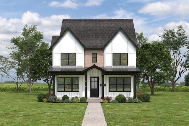 modern farmhouse style home with a front lawn