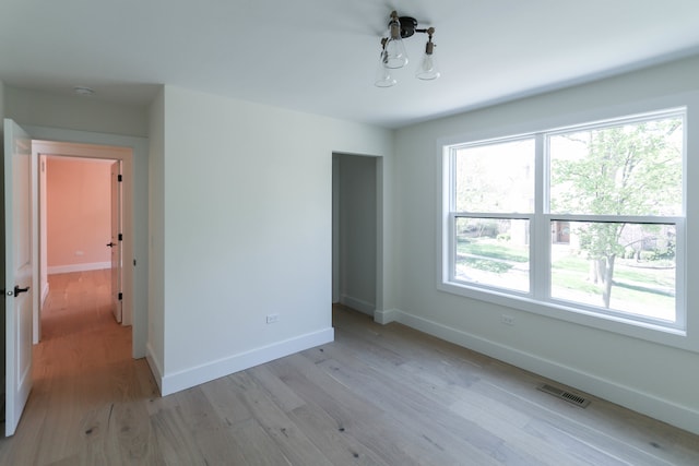 unfurnished bedroom featuring light hardwood / wood-style flooring