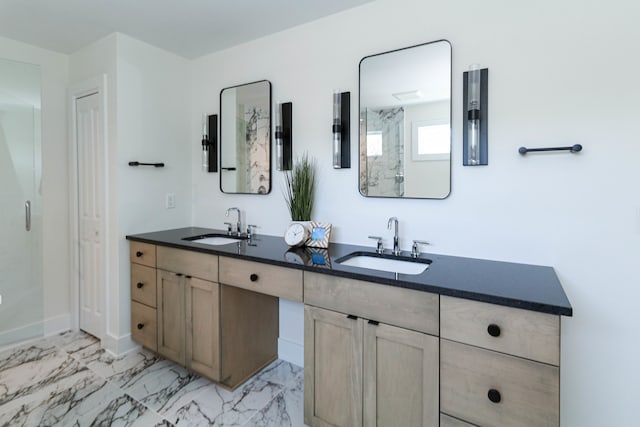 bathroom featuring tile patterned flooring and double vanity