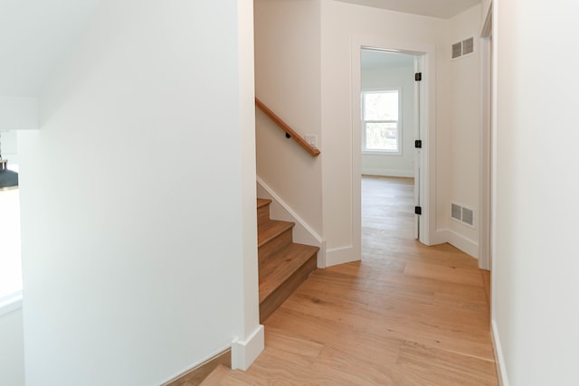 hallway featuring light hardwood / wood-style flooring