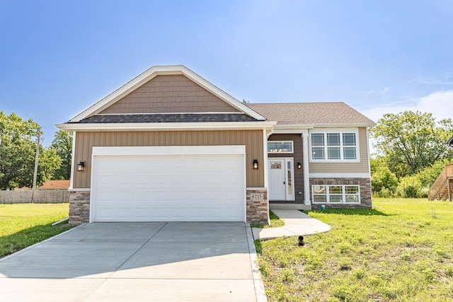 view of front of home featuring a shingled roof, concrete driveway, stone siding, an attached garage, and a front yard