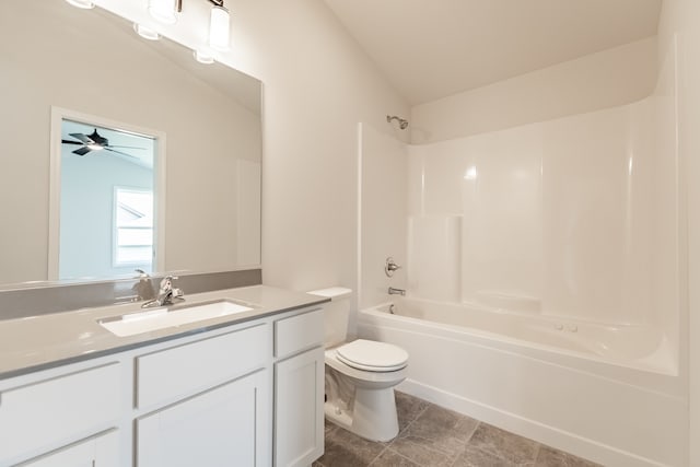 full bathroom with tile floors, toilet, shower / bathing tub combination, ceiling fan, and oversized vanity