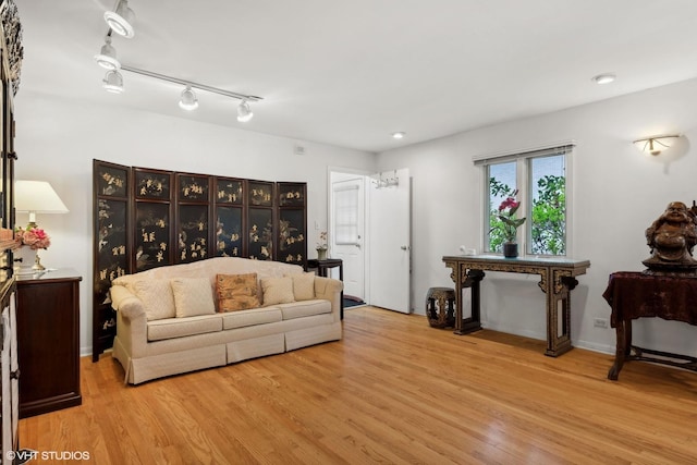 living room with light hardwood / wood-style floors