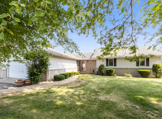 ranch-style house with a front lawn and a garage