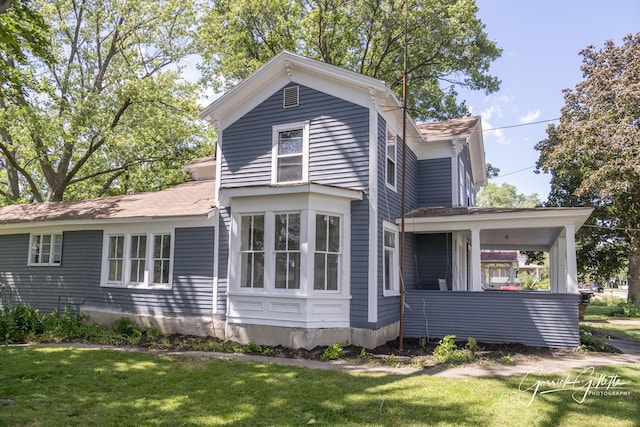 exterior space featuring a yard