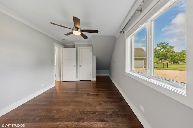 bonus room featuring ceiling fan and dark wood-type flooring