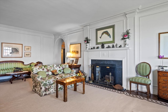 living room featuring hardwood / wood-style flooring and ornamental molding