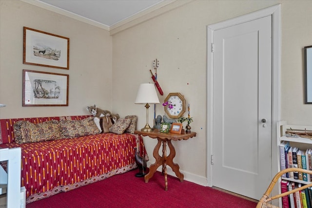 bedroom with crown molding and carpet