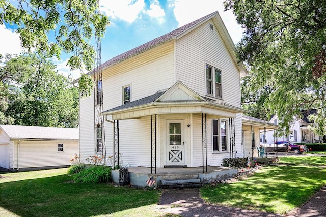 farmhouse-style home with a front lawn and a porch