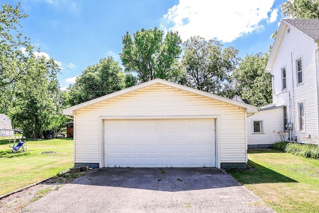 garage with a lawn