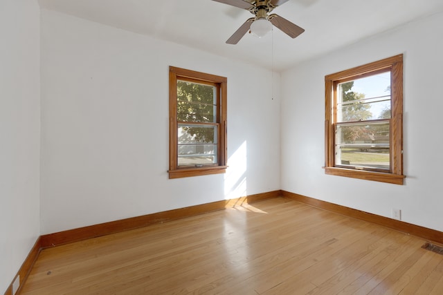 unfurnished room with light hardwood / wood-style floors and ceiling fan