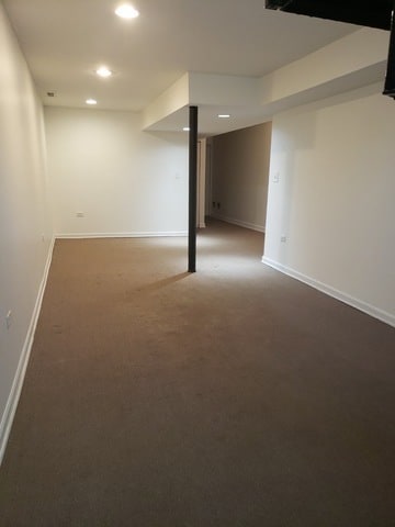 basement featuring carpet floors