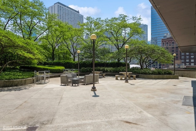 view of property's community featuring a patio