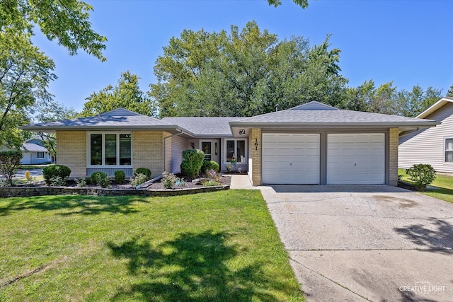 ranch-style home with a garage and a front yard