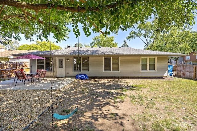 back of house with a patio area