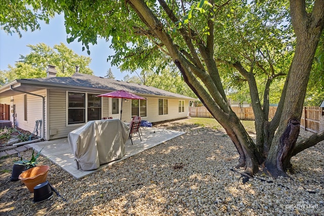 back of house featuring a patio