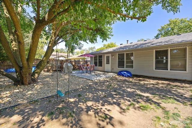 rear view of house with a patio area