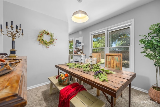 dining area with carpet flooring