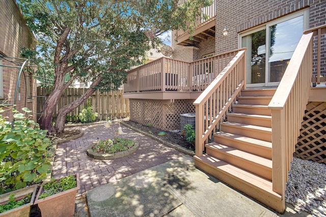 wooden terrace featuring outdoor lounge area