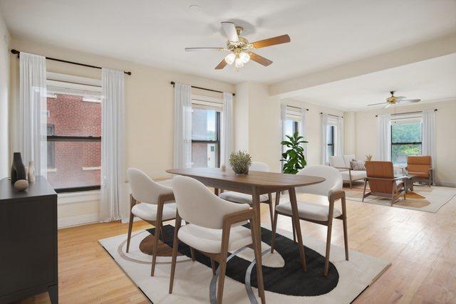 dining room featuring light wood-type flooring and ceiling fan