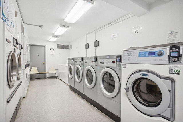 clothes washing area with independent washer and dryer and stacked washing maching and dryer