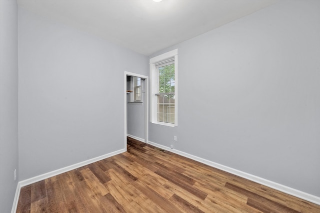 empty room featuring hardwood / wood-style floors