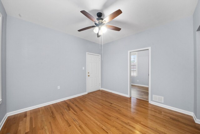 unfurnished bedroom with light hardwood / wood-style floors and ceiling fan