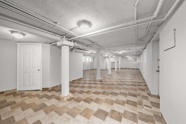 basement with light tile patterned floors