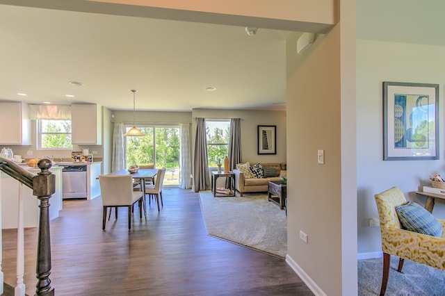 dining space featuring hardwood / wood-style floors