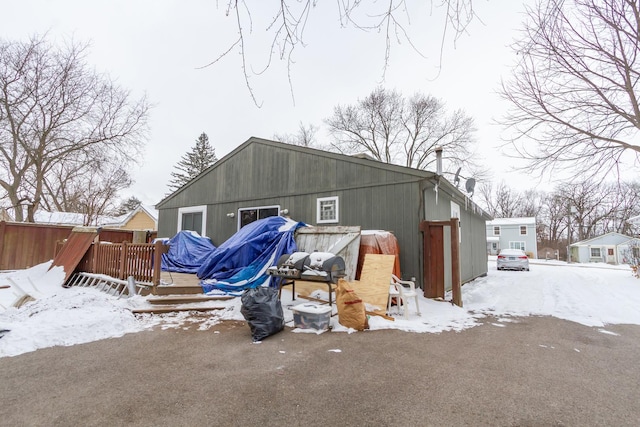 view of snow covered house