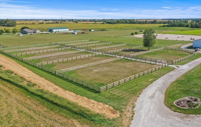 birds eye view of property featuring a rural view