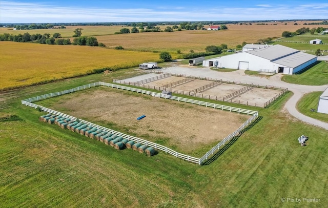 birds eye view of property featuring a rural view