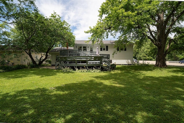 view of yard with a wooden deck