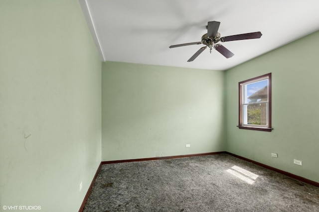 carpeted empty room with ceiling fan