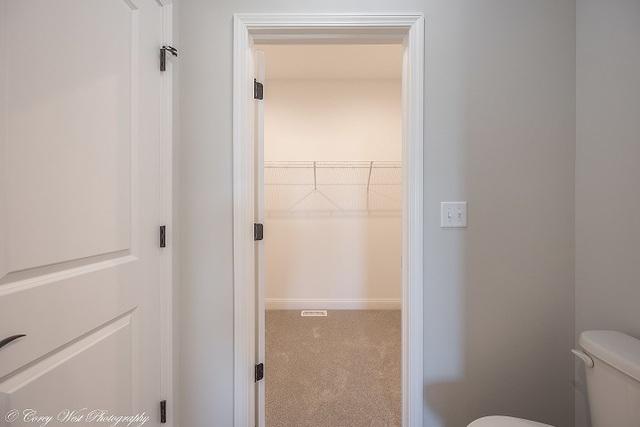 bathroom featuring toilet