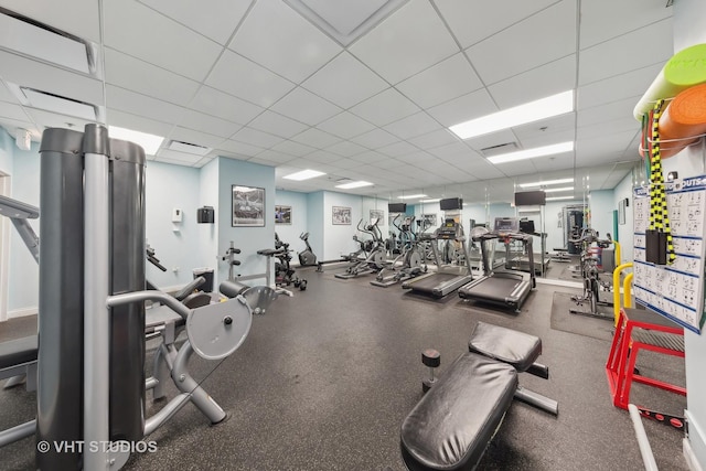 workout area with a drop ceiling