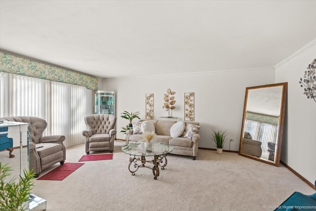 living room with carpet floors, ornamental molding, and a wealth of natural light