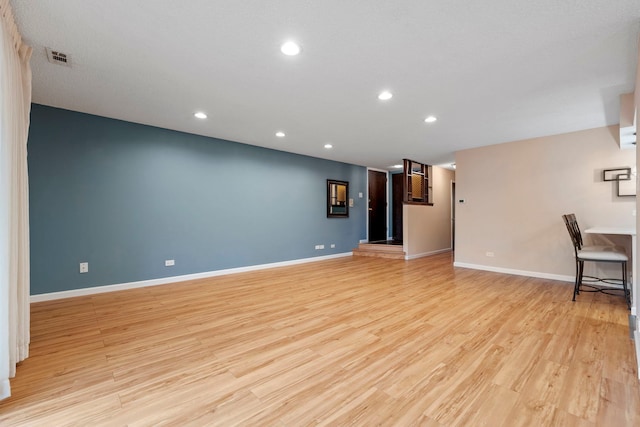 empty room featuring light hardwood / wood-style floors