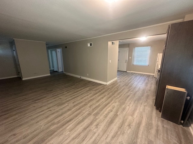 spare room featuring hardwood / wood-style floors