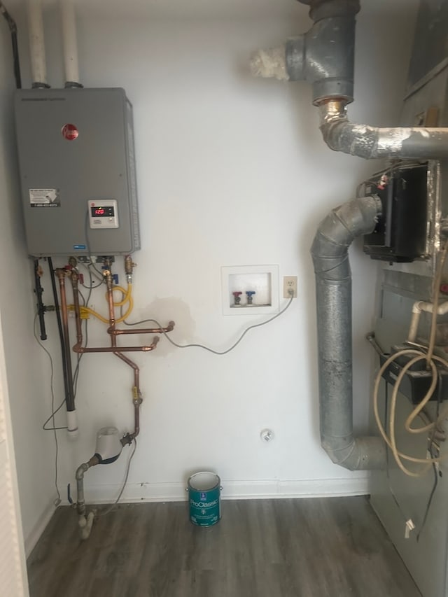 utility room with water heater