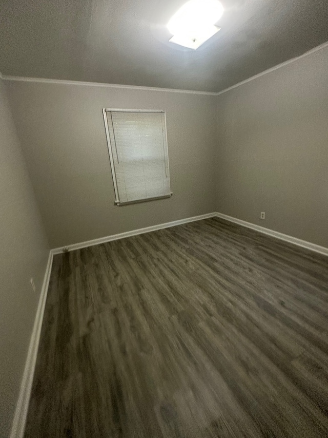 unfurnished room with dark hardwood / wood-style floors and a textured ceiling