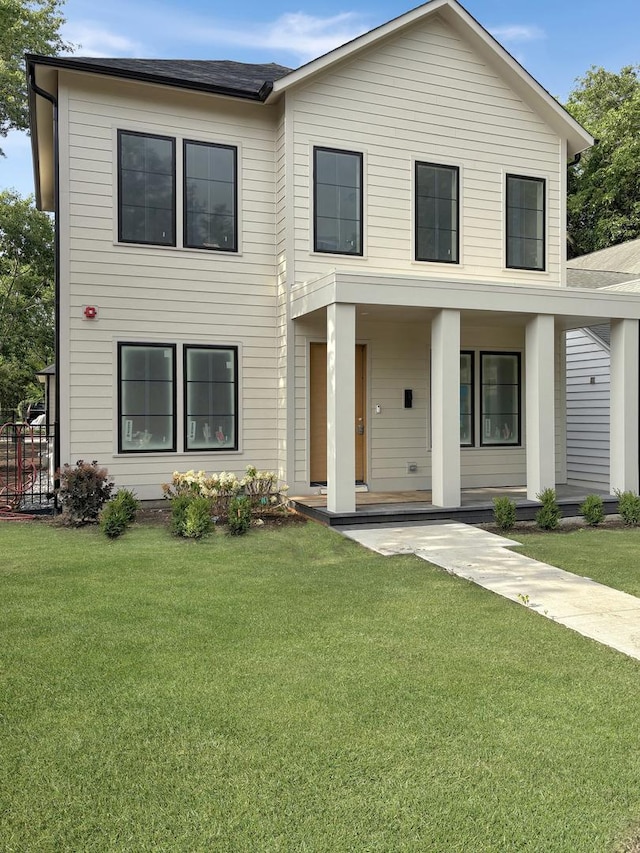 146 Sterling Ln, Wilmette, IL 60091 - view of front of home featuring a porch, a front yard, and roof with shingles