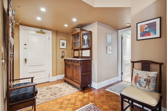 living area featuring parquet floors