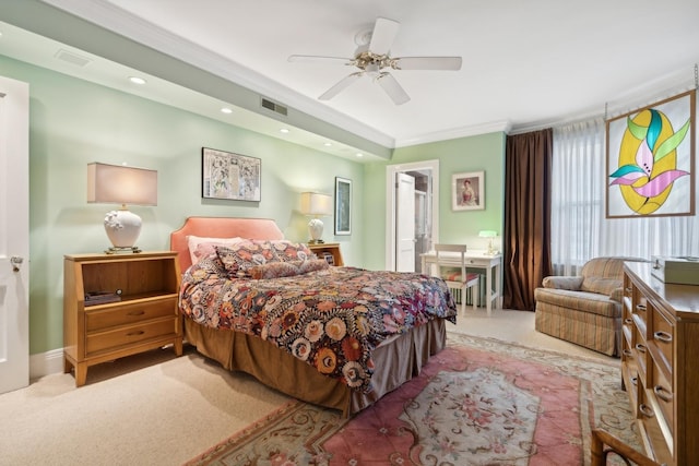 bedroom featuring ceiling fan, ornamental molding, and light colored carpet