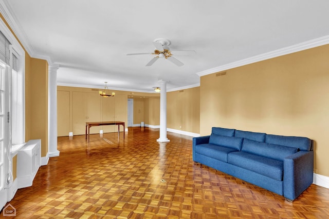 living room featuring crown molding, ceiling fan with notable chandelier, and parquet flooring