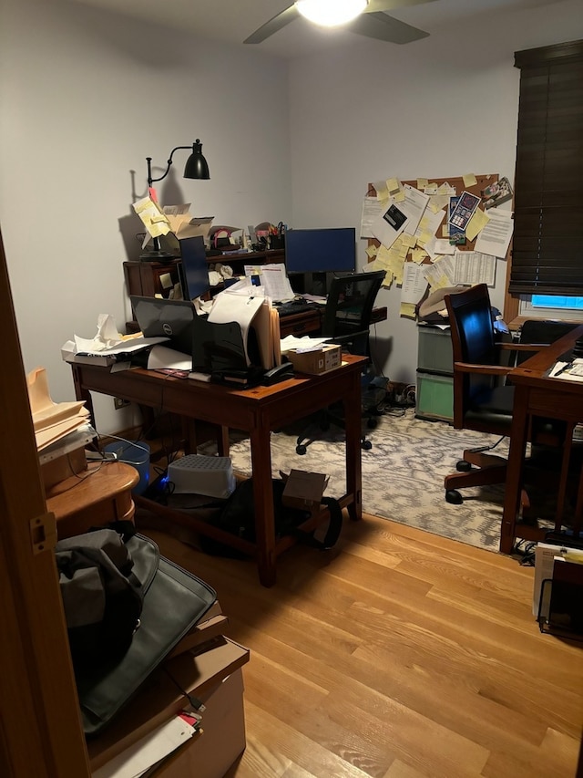 office area with ceiling fan and hardwood / wood-style flooring