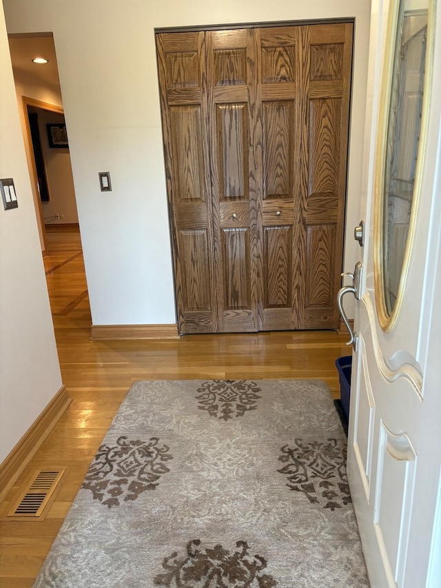 foyer featuring light hardwood / wood-style flooring