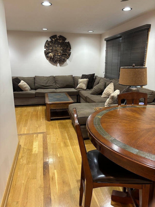 living room with light hardwood / wood-style floors