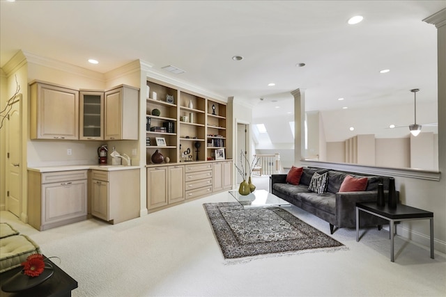 carpeted living room with crown molding